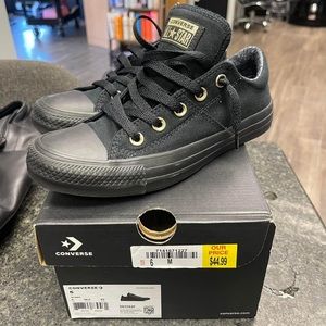 Brand-new women’s converse, black and gold